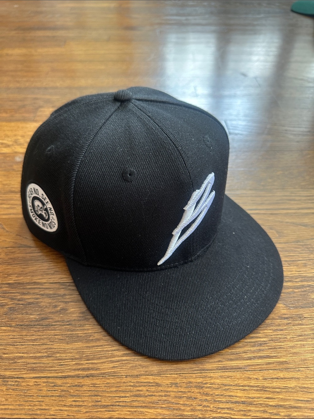 Black Flat-Brim Hat with White Embroidered Logo